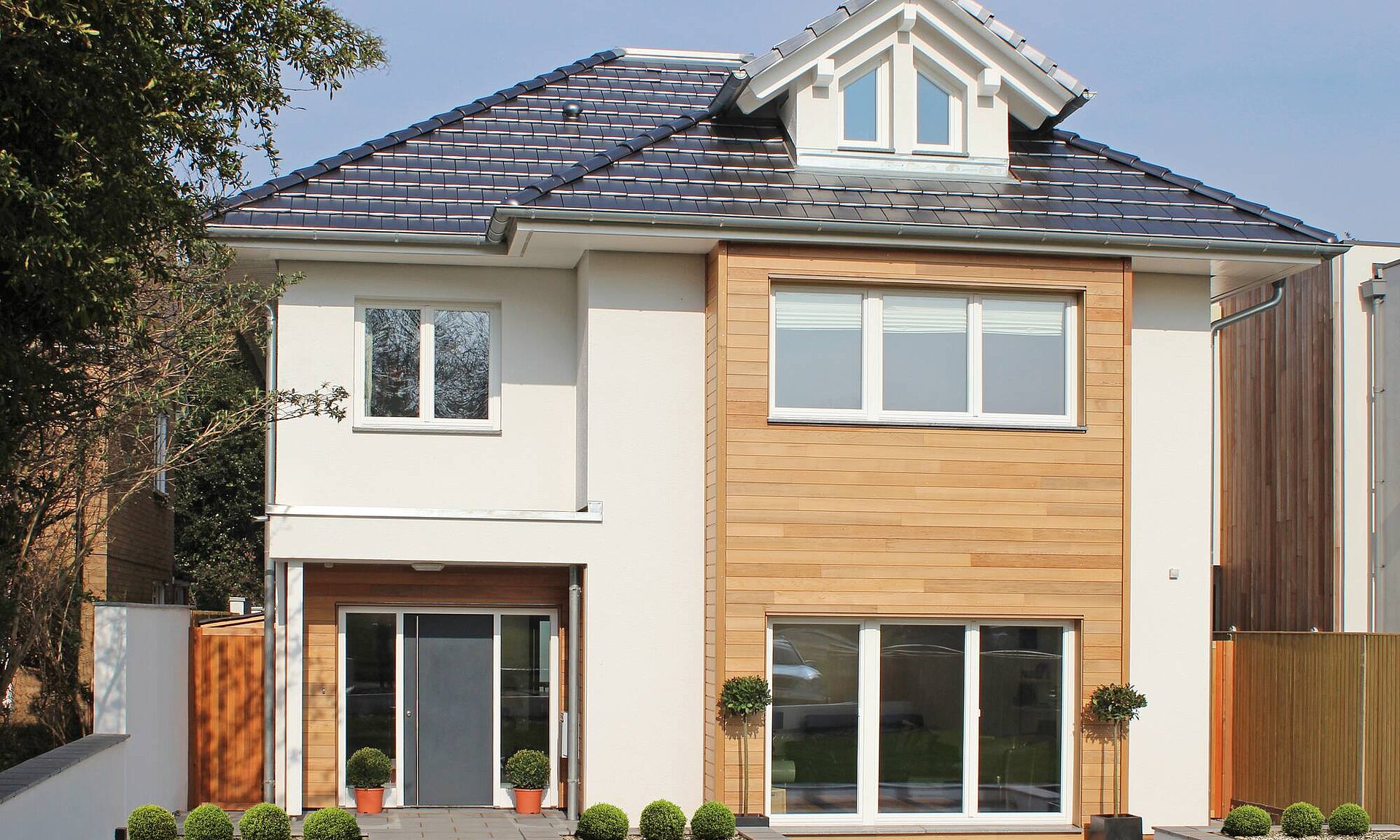 Open plan prefabricated house with sliding door - WeberHaus-Wimbledon Open plan prefabricated house with sliding door - WeberHaus-Wimbledon